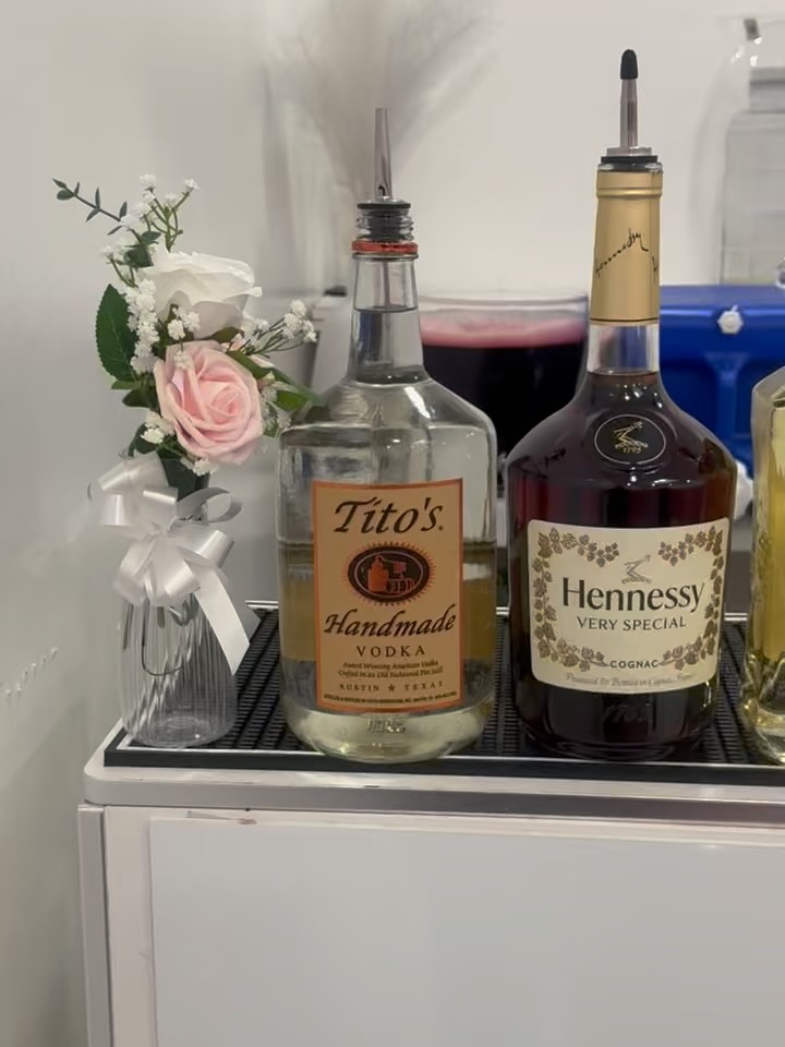 Premium spirits styled with fresh florals